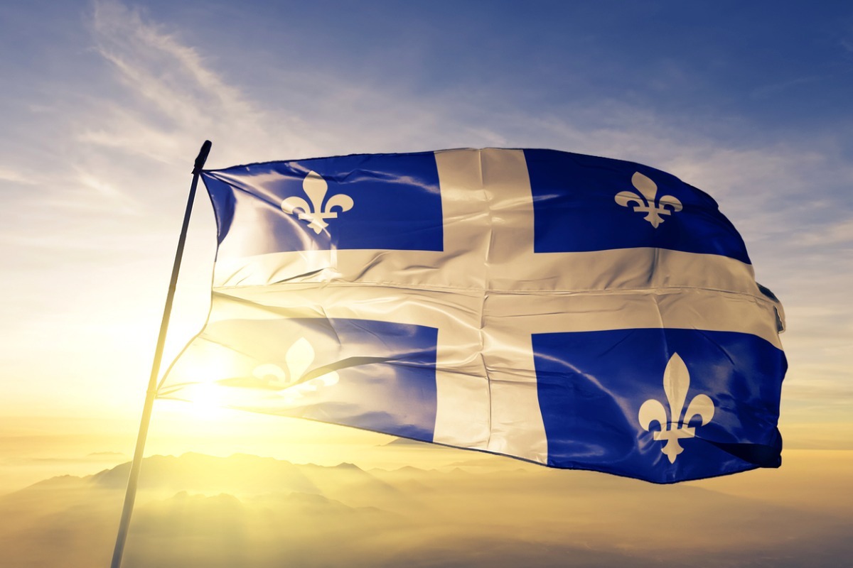 Quebec province of canada flag textile cloth fabric waving on the top picture id1063375830