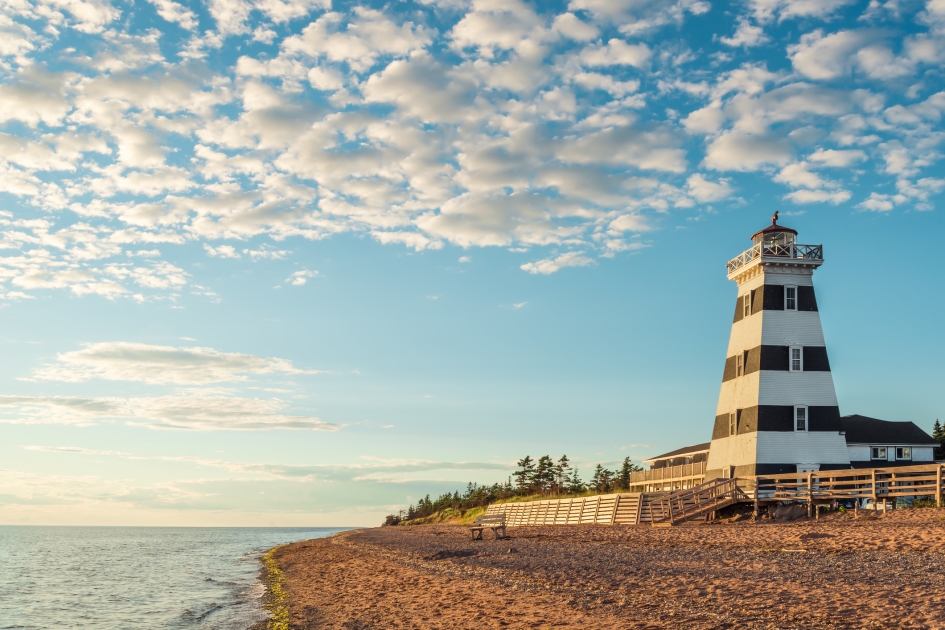 An image of a lighthouse in Cedar Dunes Provincial Park in Prince Edward Island, Canada.