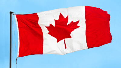 Canada flag on a clear day