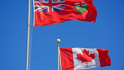 Ontario canada flag over clear sky