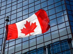 Canada flag in front of building