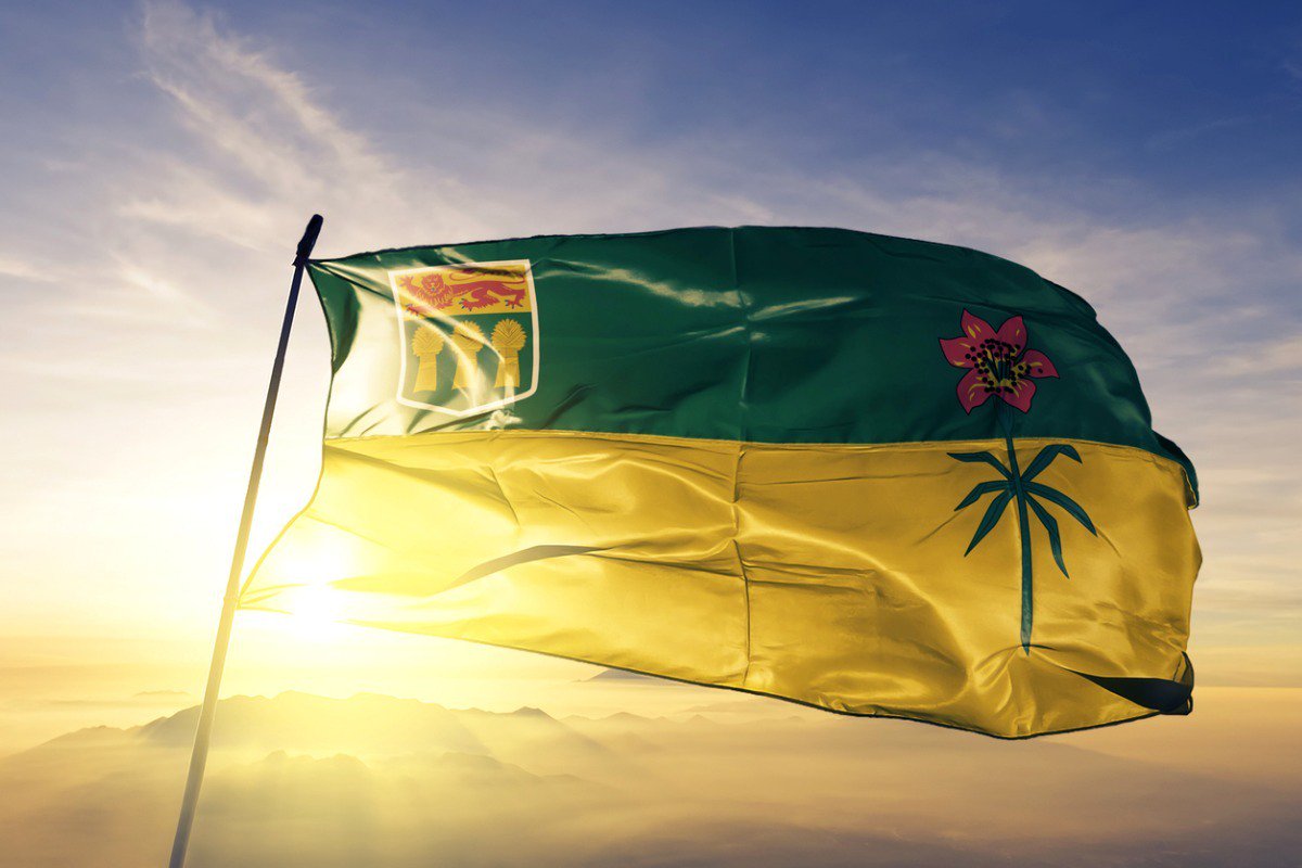 Saskatchewan province of canada flag textile cloth fabric waving on picture id1063375836
